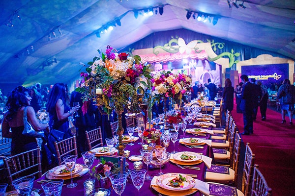 An elaborate dinner table with flowers at a private L.A. LIVE event.