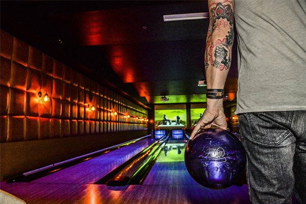 A man prepares to bowl at Lucky Strike.